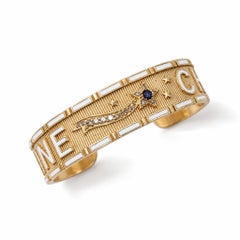 Pulsera tipo brazalete con zafiro azul, diamantes blancos y estrella, esmalte blanco
