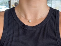 Collier avec pendentif en perle de culture, or jaune 14 carats