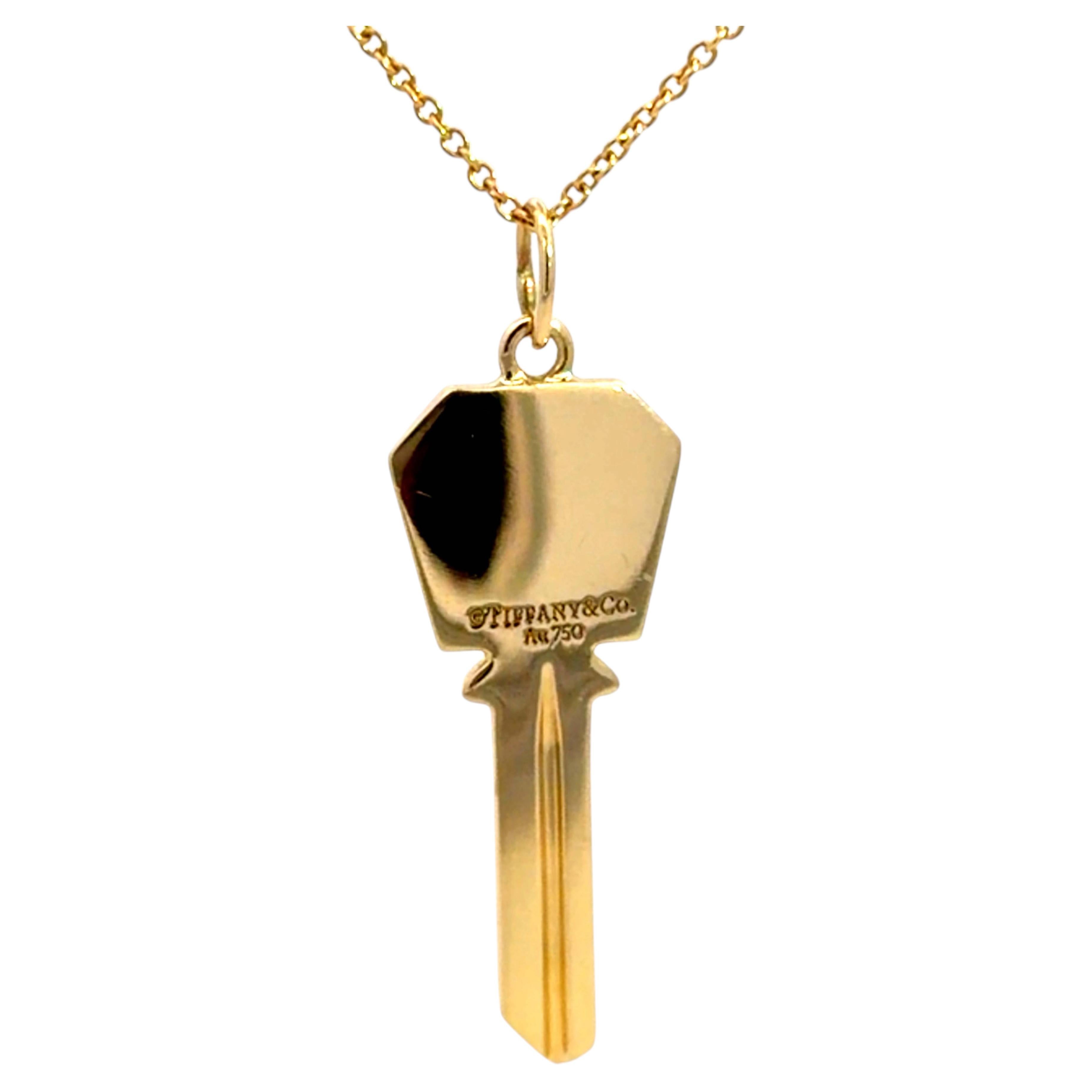 Vintage Tiffany & Co. Collier avec pendentif en forme de clé, en or jaune 18 carats