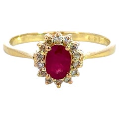 Vintage Oval Ruby and Diamond Halo Ring 14k Yellow Gold