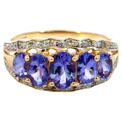 Ring mit 5 ovalen Tansaniten und Diamanten aus 14-karätigem Gelbgold