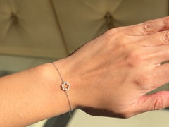 Bracelet à maillons en forme de trèfle et diamants, en or blanc 14 carats