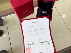 Anello Cartier Trinity, modello classico con cinque diamanti, in oro 18 carati