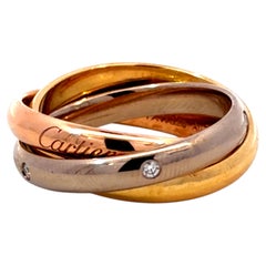 Anello Cartier Trinity, modello classico con cinque diamanti, in oro 18 carati