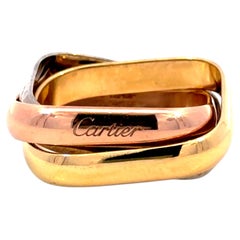 Anello Cartier Trinity a forma di cuscino in oro 18 carati