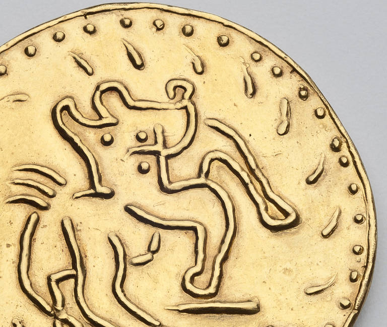 An 18 karat gold pendant of a centaur by Picasso (1881-1973).  The two inch disc is signed and numbered 5/20 with an inventory number of #1439.  Picasso made a similar design in ceramic which is shown in the catalogue raisonne by Ramie  