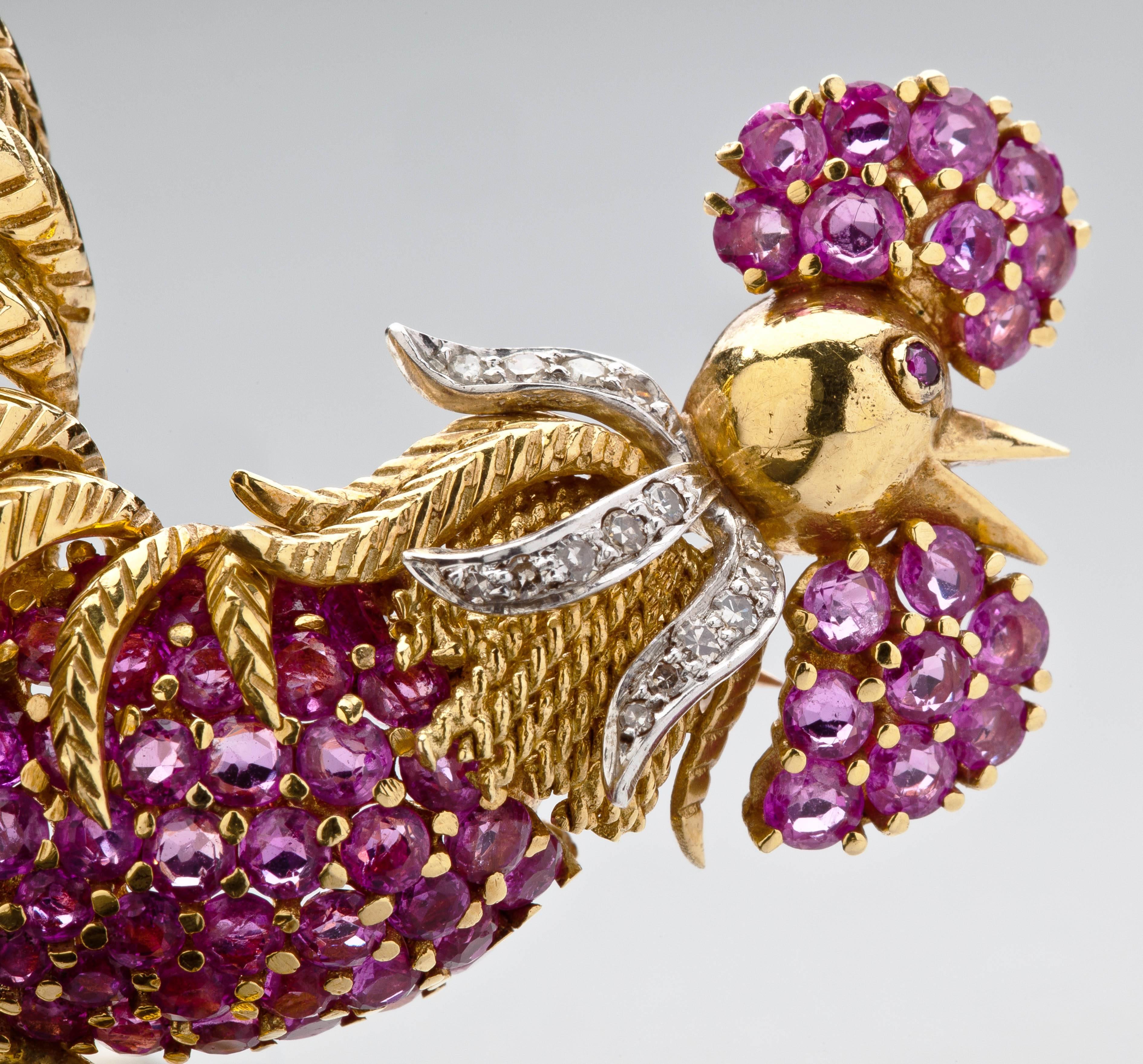 This strutting 18 karat gold rooster from Tiffany has a stomach and cockscomb of rubies, a feathered neck of diamonds and a textured gold tail.  He is the cock of the walk. The rubies total 3.5 carats and are beautifully matched in rich red color. 