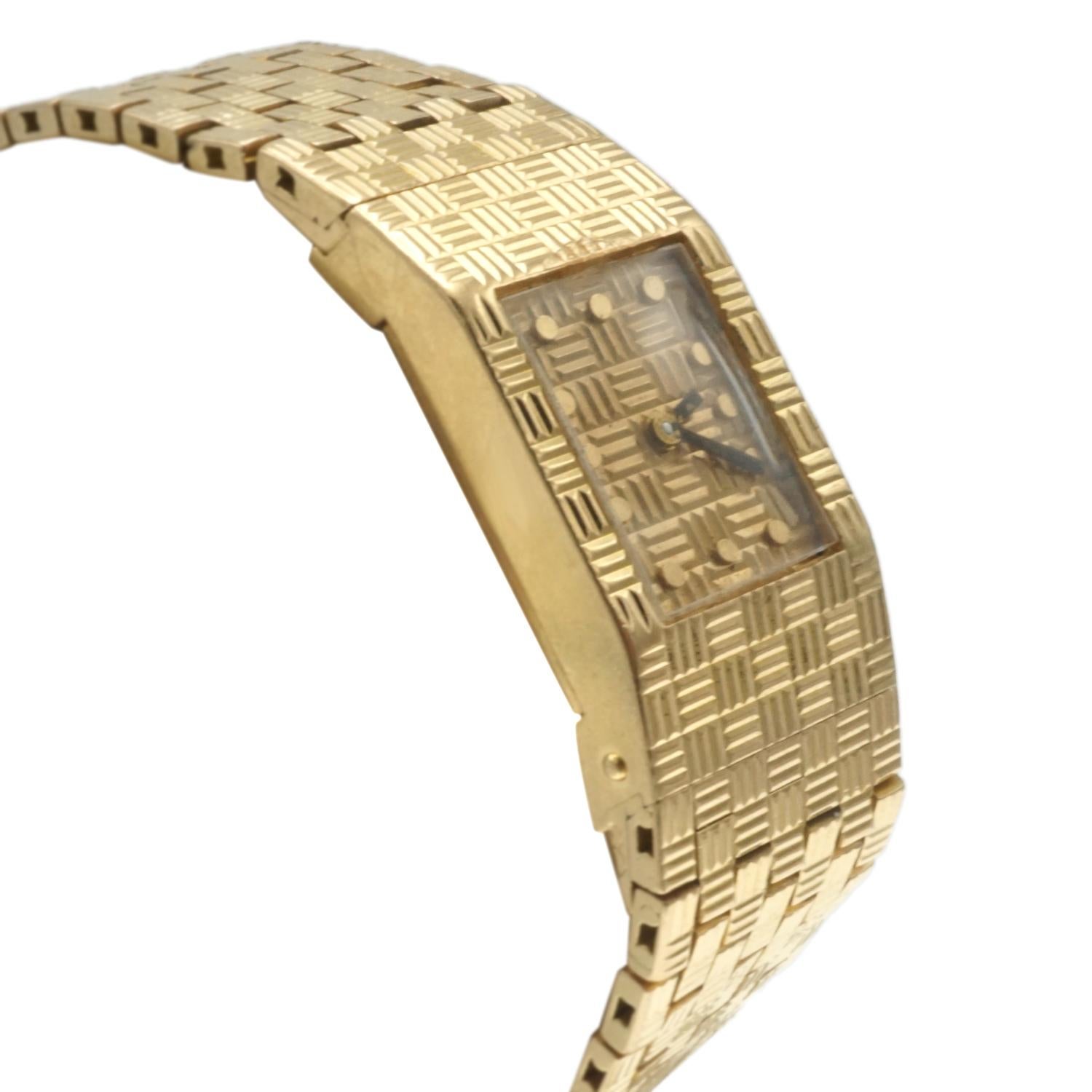 Montre-bracelet et bracelet en or jaune 18 carats.  Mesure de la longueur totale  L 7
