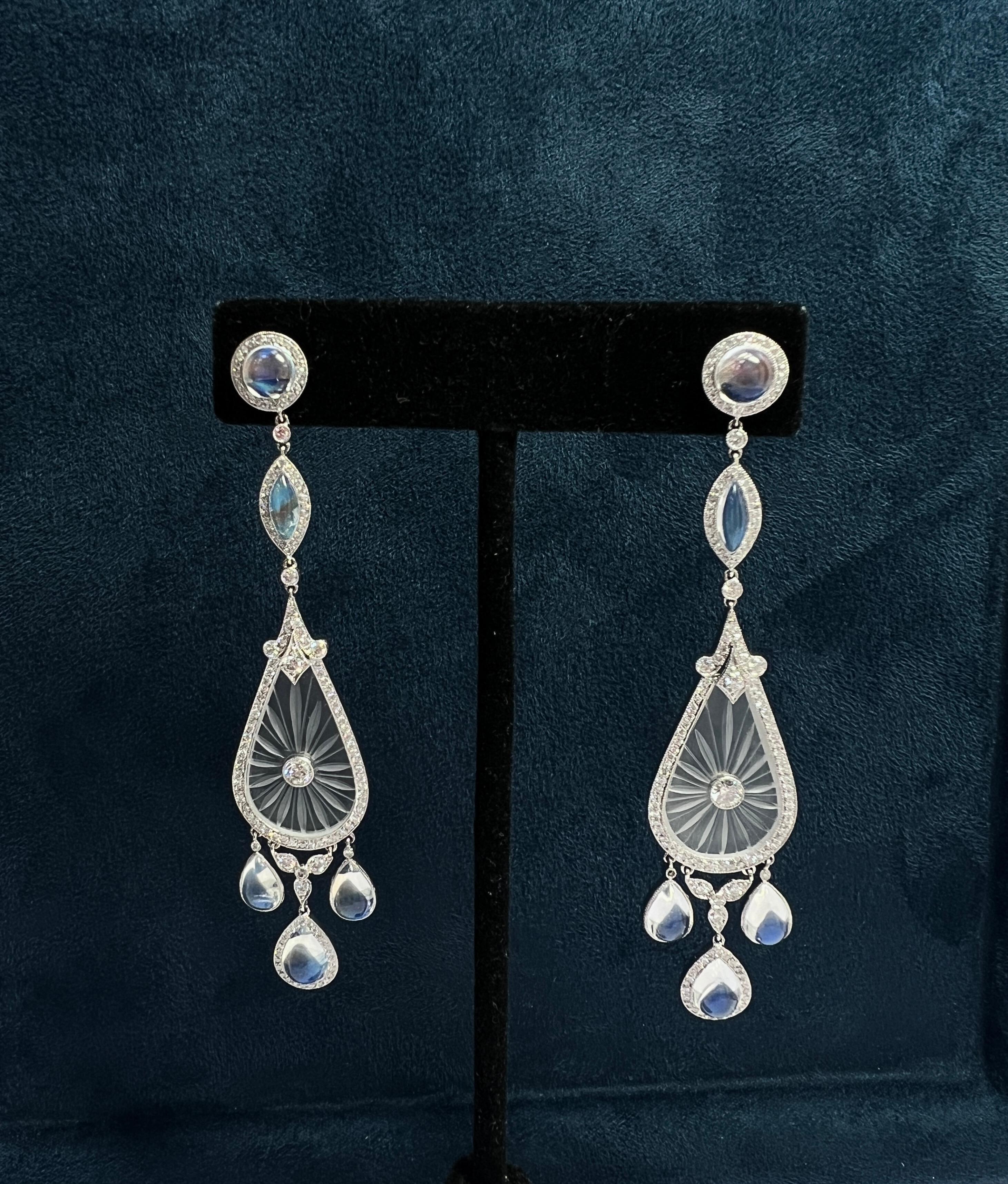 Fred Leighton Diamond Rock Crystal and Moonstone Chandelier Earrings

In platinum, about 3.0 cts diamonds, and 6.0 cts of moonstone. 
Length 3 1/2