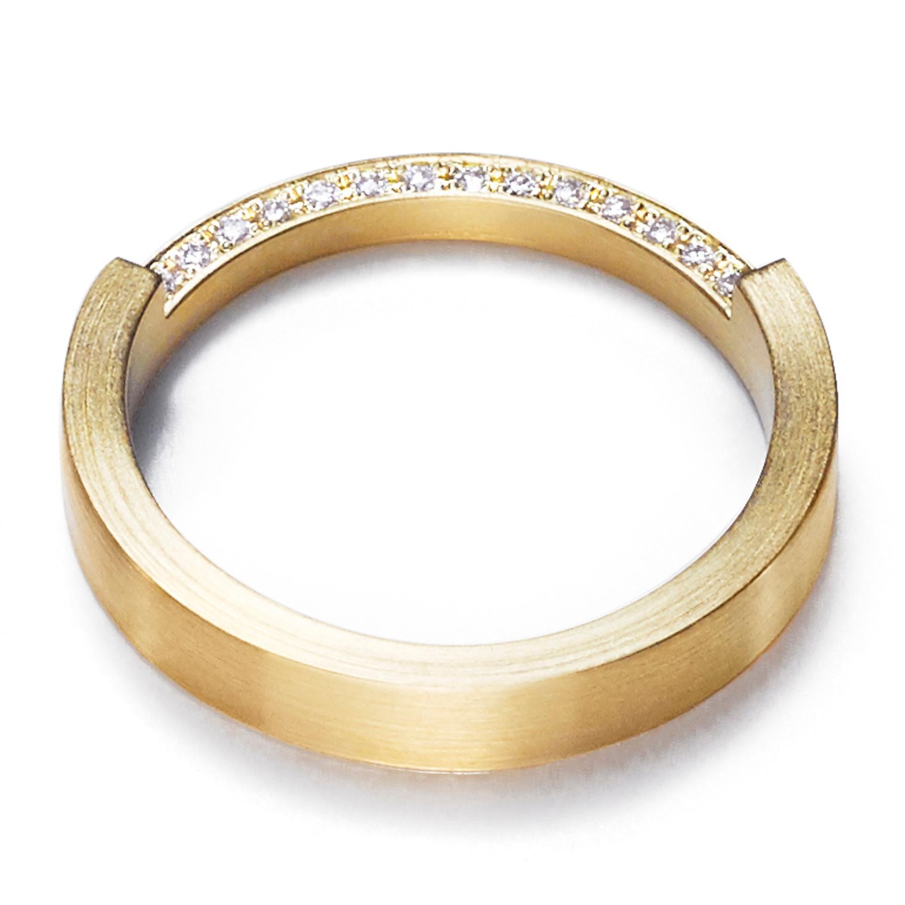 The 'Assemble 02' ring has a square edge band with a third of the band narrowed in half and filled with diamonds. Ideal for stacking* with other rings from the 'Assemble' range.

Diamond: 1mm (amount varies depending on ring size)
Band width: 3.6mm,