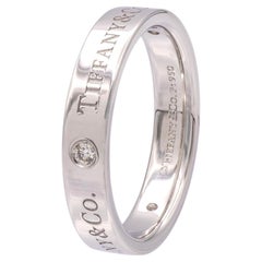 Tiffany & Co. Alianza de boda con el logotipo y 3 diamantes de 4 mm, de platino, talla 7,25