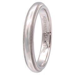Tiffany & Co. d'epoca. Fede nuziale "Together" con doppio milgrain, platino, 3 mm