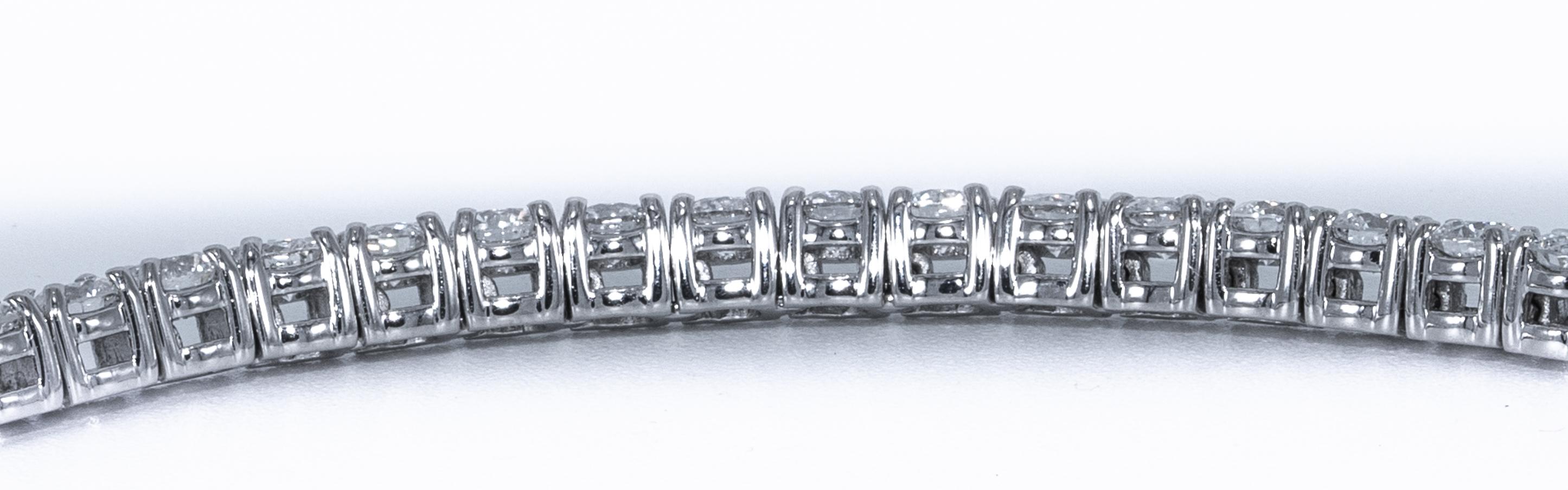 Round Cut Diamond Line Tennis Bracelet, 6.33 Carat Total by The Diamond Oak