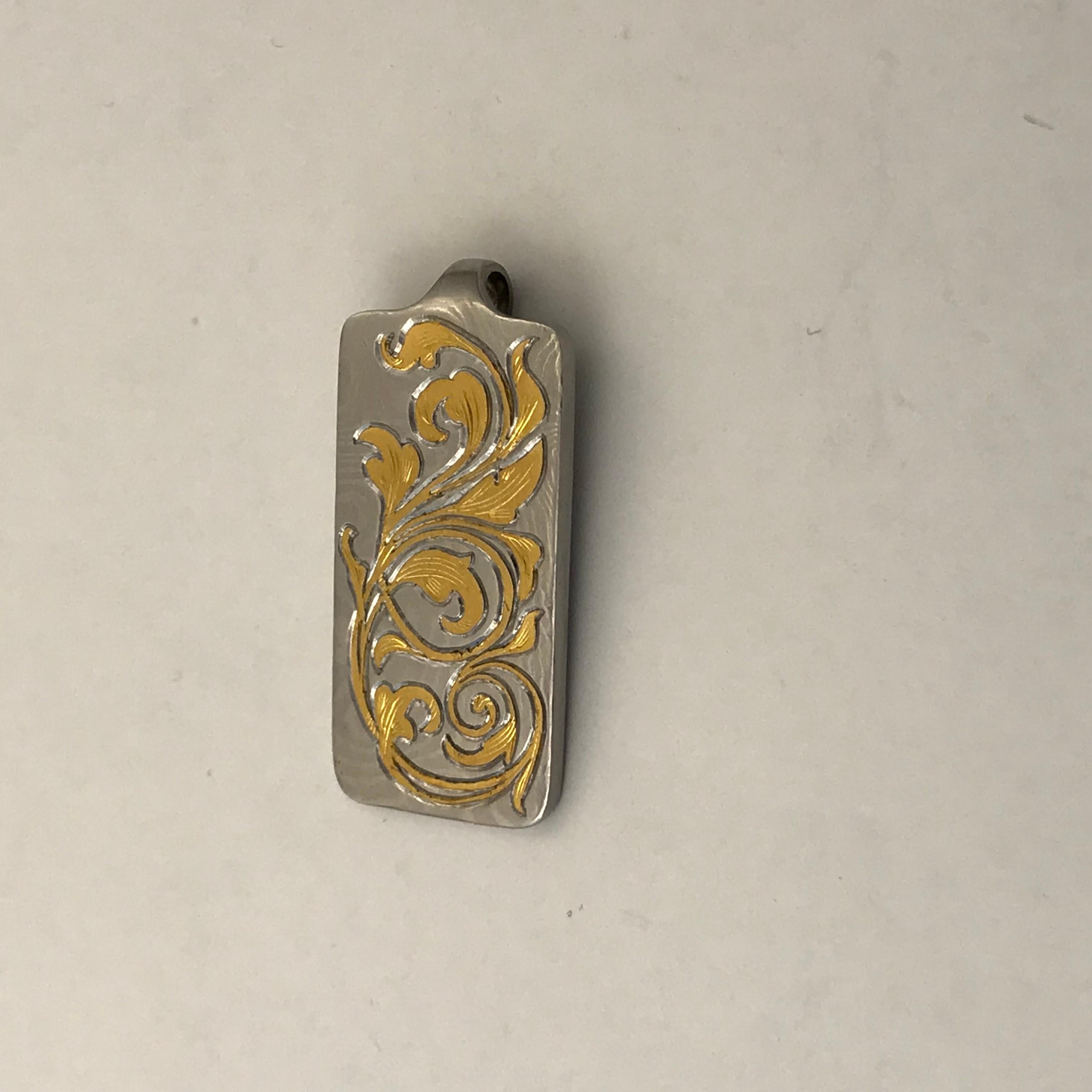 Contemporary Damascus Steel and 24 Karat Gold Pendant For Sale