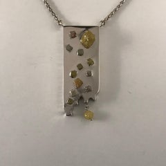 Pendant with 13 Raw Diamonds Set in 14 Karat White Gold