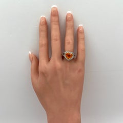 Cocktailring aus Platin und 18 Karat Gelbgold mit Mandarin-Granat und weißem Diamanten