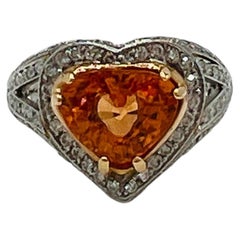 Cocktailring aus Platin und 18 Karat Gelbgold mit Mandarin-Granat und weißem Diamanten