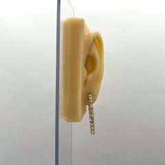 White Diamond Oval Hoop Earrings in 18k Yellow Gold