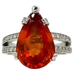 Mandarin Garnet Pear and White Diamond Round Diamond Ring in Platinum
