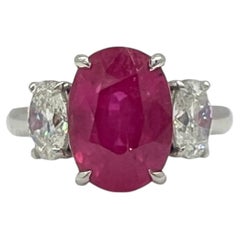 GIA 7 Carat Burma Pink Oval Sapphire and White Oval Diamond Ring in Platinum