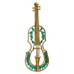 Paraiba Tourmaline and White Diamond Cello Brooch in 18K Gold