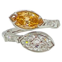 GIA Marquise Fancy Vivid Orange and White Diamond Bypass Ring in Platinum