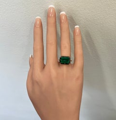 4.38 Carat Emerald Cut Emerald East West Bezel Prong Ring in Silver and 18K Gold