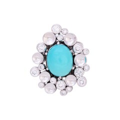 Anello modernista in platino e oro con diamanti e turchese di Toni Cavelti, 1970