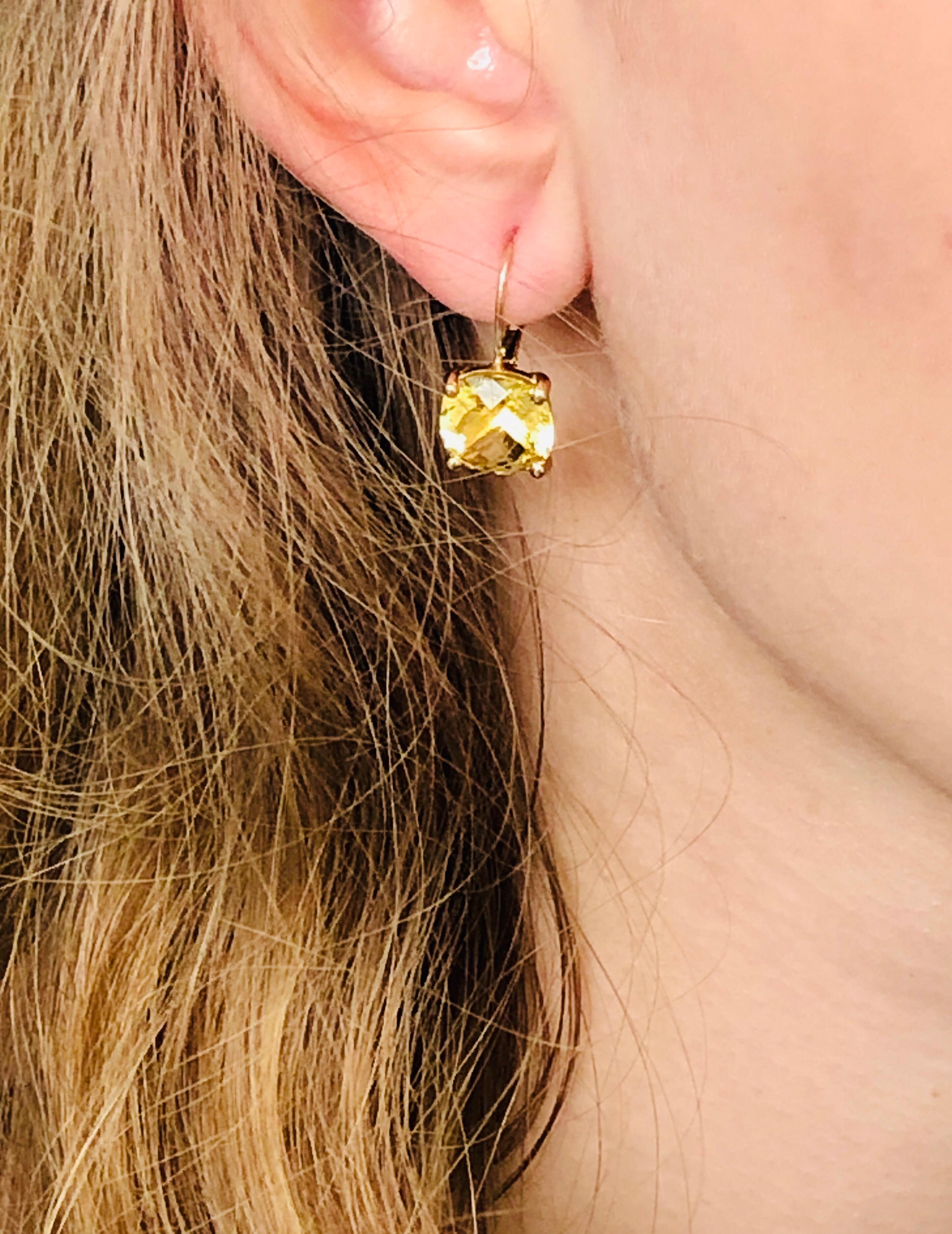 Fourteen karat yellow gold drop hoop earrings
Cushion shape yellow beryl weighing 8.20 carat 
Vivid and clear matched pair of yellow beryl 
Measuring 10 millimeter cushion shape 
New Earrings 
14 karat gold earrings are hanging off hoop backs
Our