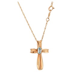 Collana con ciondolo a forma di croce in oro giallo 14K