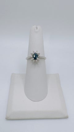 Dark Blue Sapphire and Small Diamond Cluster Ring, 14 Karat White Gold, 0.70ctw