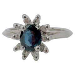 Dark Blue Sapphire and Small Diamond Cluster Ring, 14 Karat White Gold, 0.70ctw