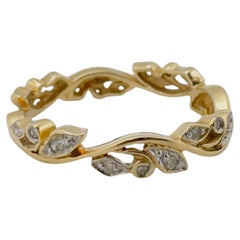 14 Karat Yellow Gold Floral Motif Shadow Band with Accent Diamonds in White Gold