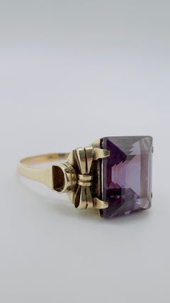 Synthetic Step-Cut Alexandrite, 14 Karat Yellow Gold, Bow Detailing Ring