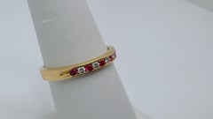 14 Karat Yellow Gold Ruby and Diamond Alternating Band, 0.30ctw, Size 6