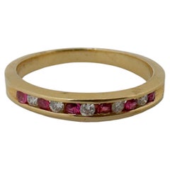 14 Karat Yellow Gold Ruby and Diamond Alternating Band, 0.30ctw, Size 6
