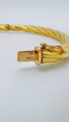 14 Karat Yellow Gold Hollow Twisted Bangle, 11.5 Grams