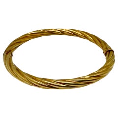 14 Karat Yellow Gold Hollow Twisted Bangle, 11.5 Grams