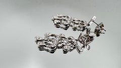 Pendientes colgantes de diamantes en oro blanco de 14 quilates, 0,50 ct en total, 4,2 gramos