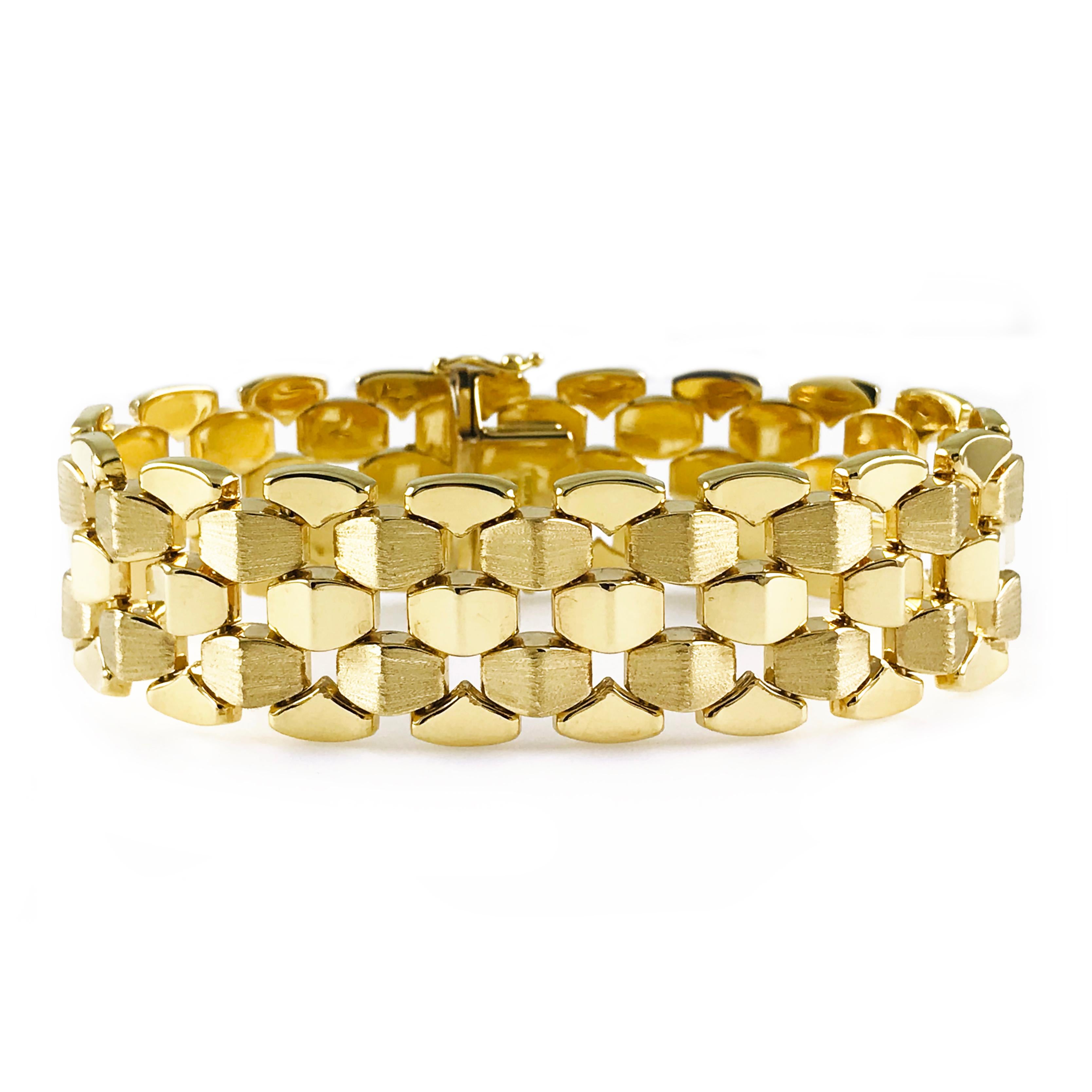 Vintage 18K Yellow Gold Italian Milros Multi-Textured Bracelet. This bold yet elegant wide band bracelet shines abundantly with stately luxury. Hallmark on clasp states 14k Italy Milros. 