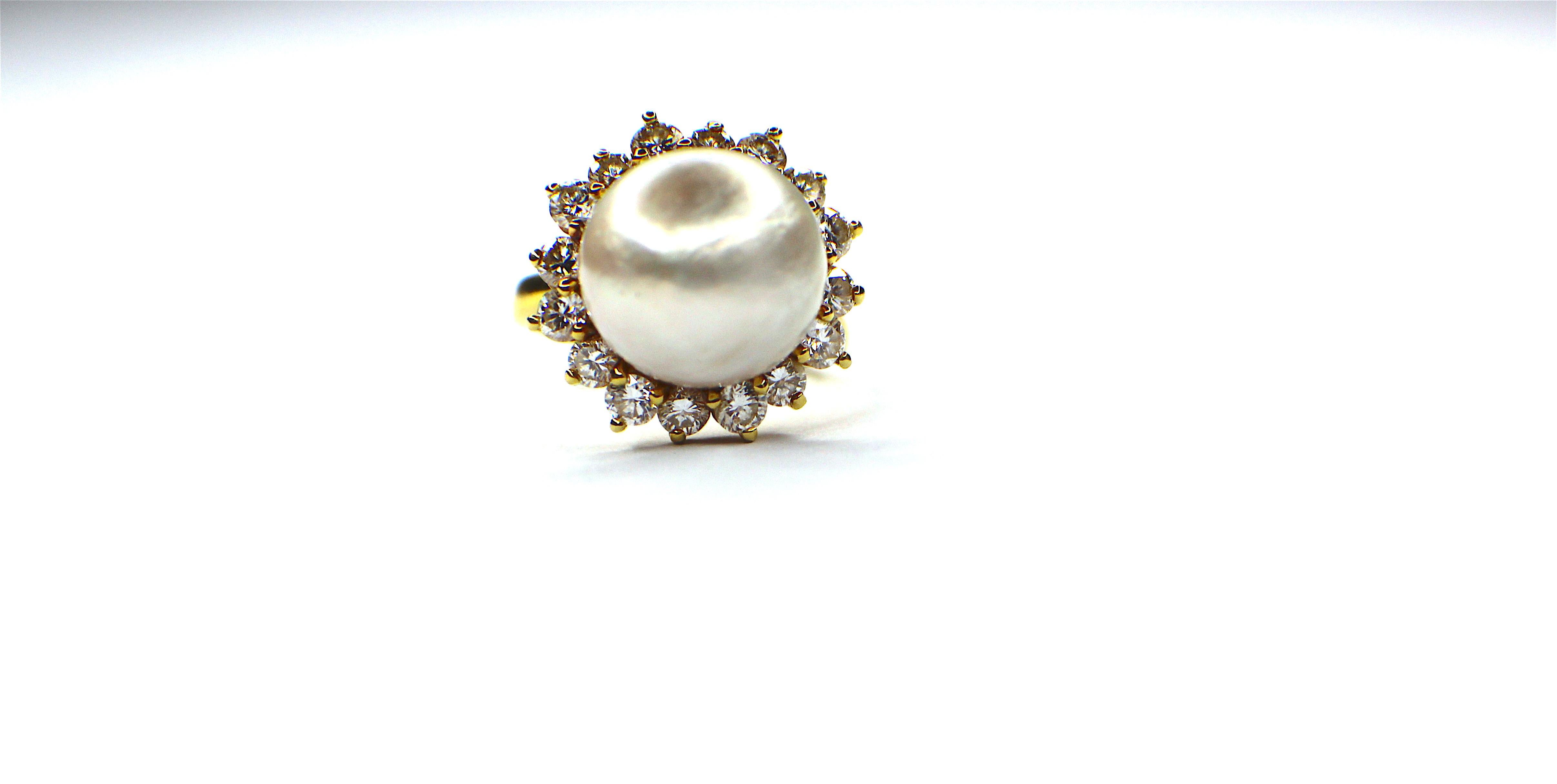 Gemolithos, Cultured South Seas Pearl & Diamond Ring, est. diamonds circa 1.0ct, 18k gold, weight 7,5gr.  pearl 12.00 mm diameter, ring size 49.  1980´s