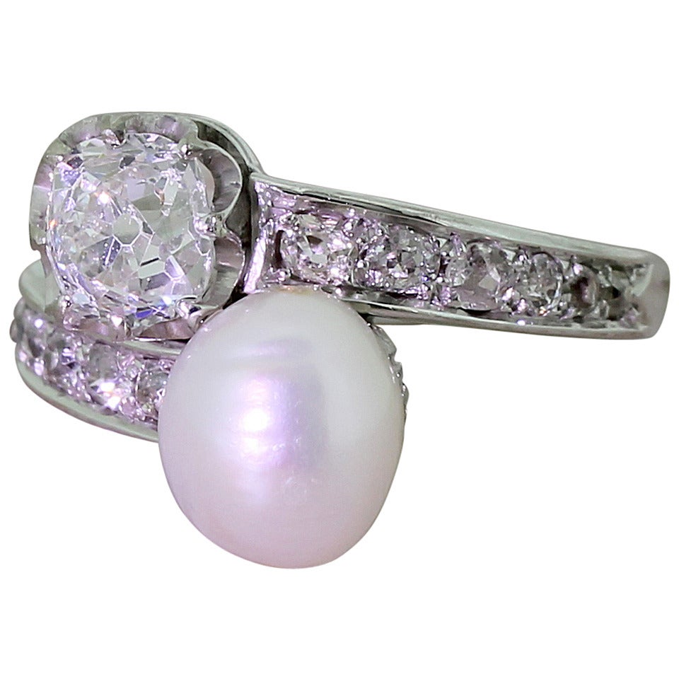 Art Deco 0.98 Carat Old Cut Diamond Natural Pearl Platinum Cross Over Ring For Sale