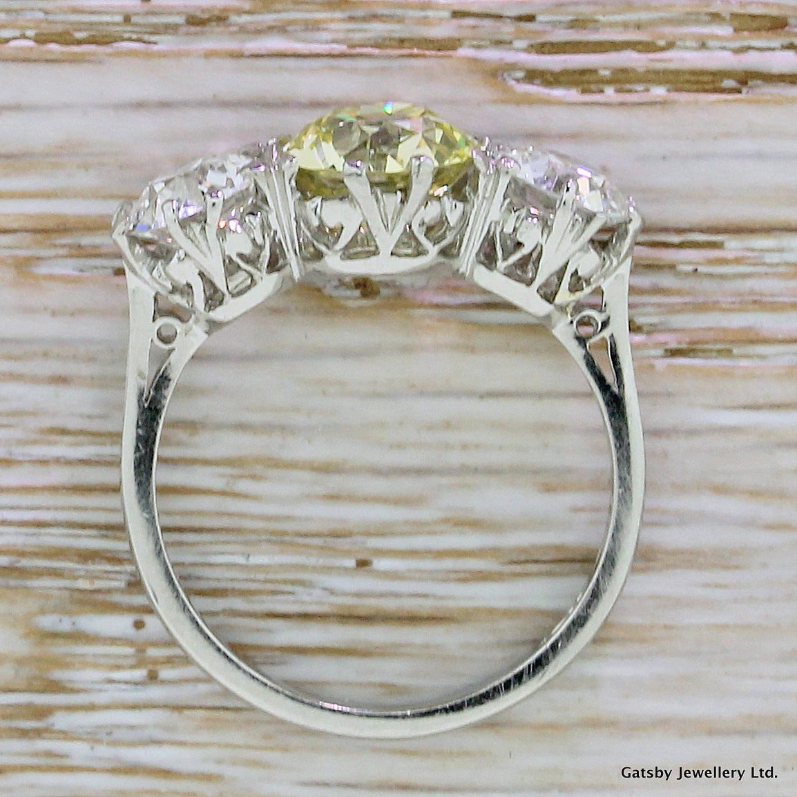 3.54 Carat Fancy Old Cut Green Yellow Diamond Platinum Trilogy Ring In Excellent Condition In Theydon Bois, Essex