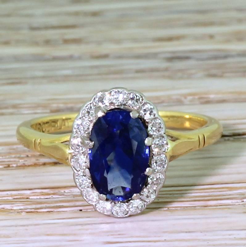 Utterly, utterly breathtaking. The rich, indigo blue sapphire displays clear flashes of cobalt and is secured by eight claws in a platinum setting. Eighteen high white and clean transitional cut diamonds are rubover set around the centre stone, and