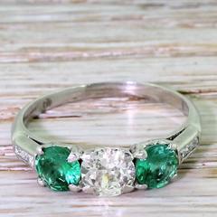 Art Deco 0.65 Carat Old Cut Diamond Emerald Platinum Trilogy Ring