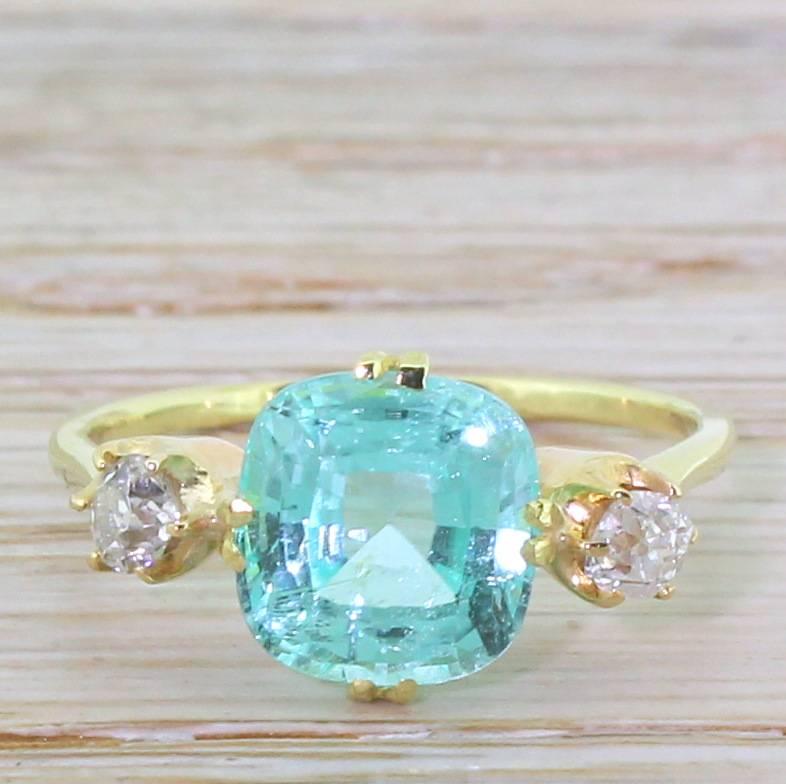 Jaw-droppingly stunning. Paraiba tourmalines are among the rarest, most valuable – and most beautiful – gemstones on earth. We set this gorgeous example in a nicely stripped back Victorian mounting we found bereft of a centre stone. The yellow gold