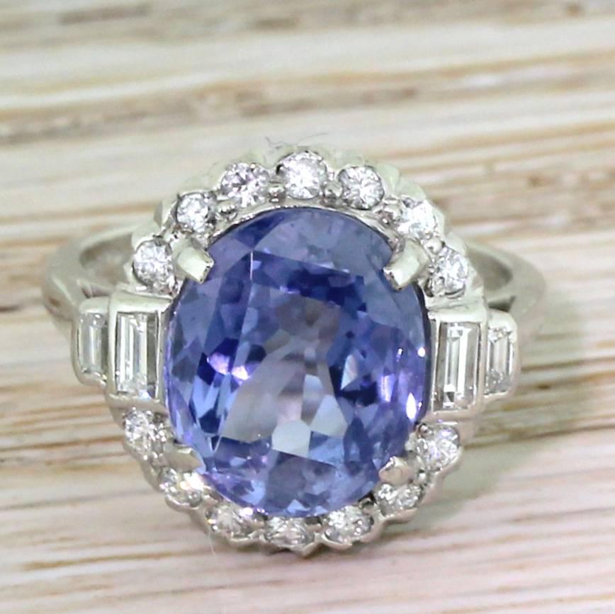 High quality in every aspect. This gorgeous ring, crafted by one of the most important American jewellery makers of the early 20th century, features a glowing sky blue natural, unheated Ceylon sapphire. The central stone is set in a surround of