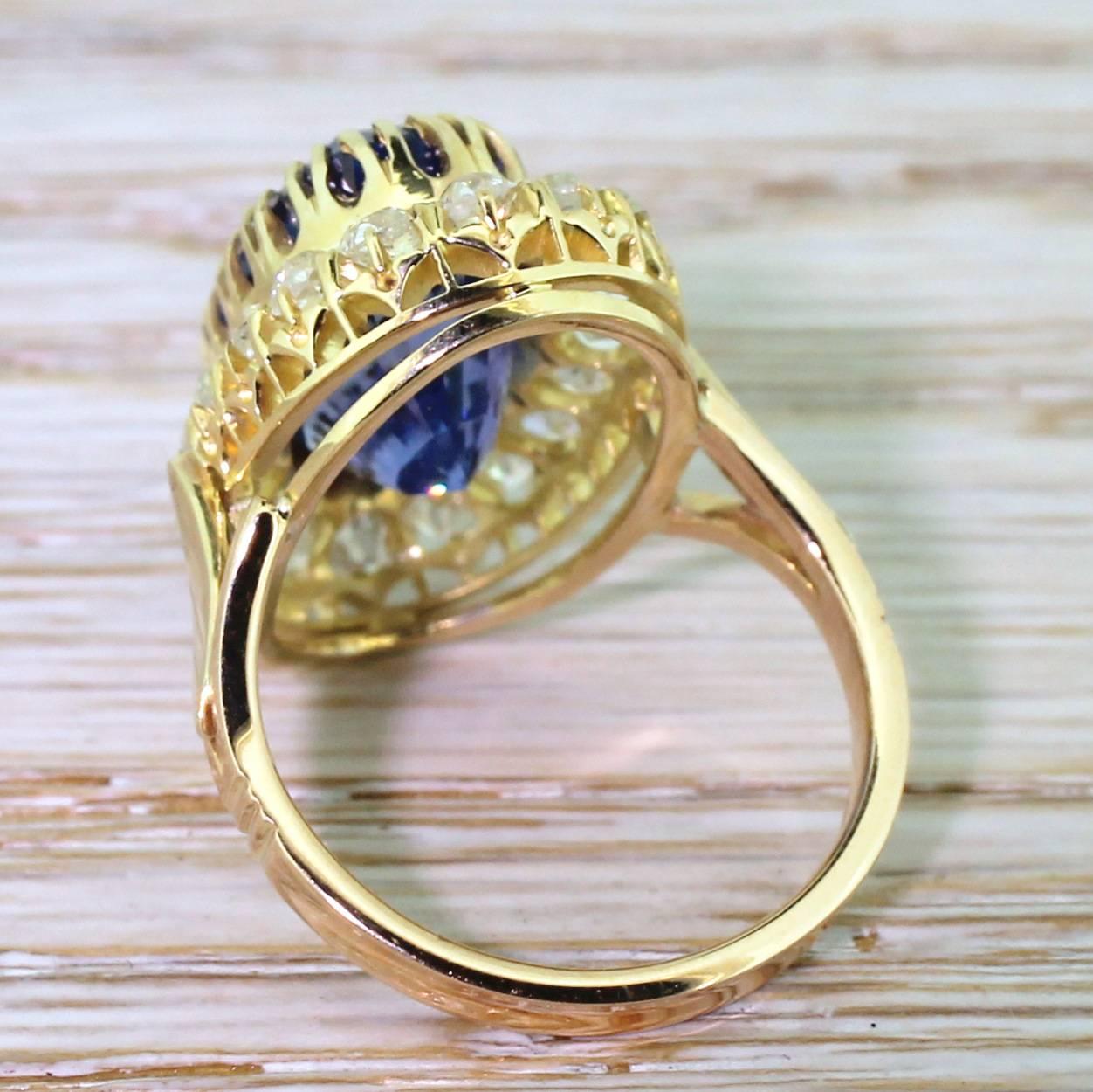 Oval Cut Edwardian 10.44 Carat Natural Ceylon Sapphire & Old Cut Diamond Cluster Ring For Sale