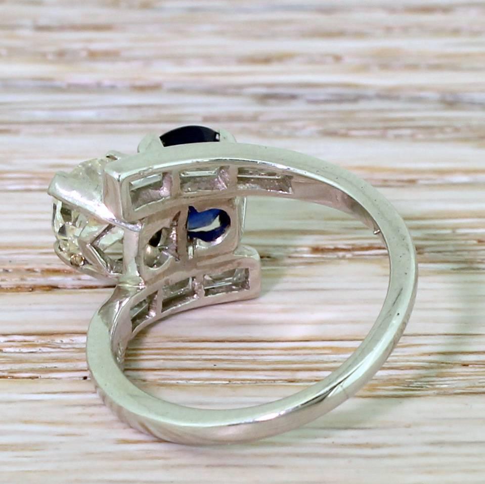 Women's Art Deco 1.33 Carat Old Cut Diamond and 1.40 Carat Sapphire Crossover Ring For Sale