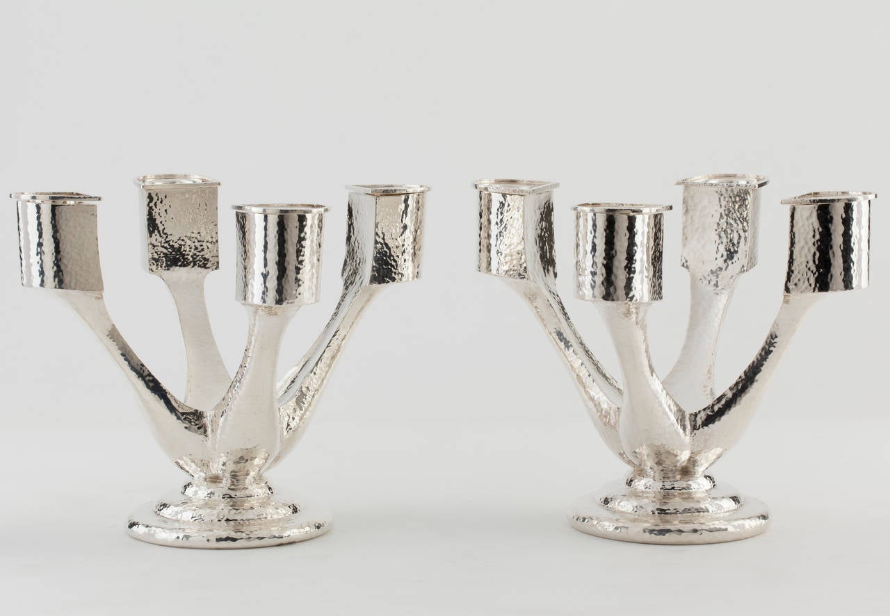 Raymond RUYS

Hammered pair of candelabra 

Silver 950

Art deco Africanizing style

Antwerp 1930

UNIQUE PIECE

Incised signature and Ruys hallmark

Exhibitions: Antwerp World Fair 1930 ( see attached photo ) 

Literature: